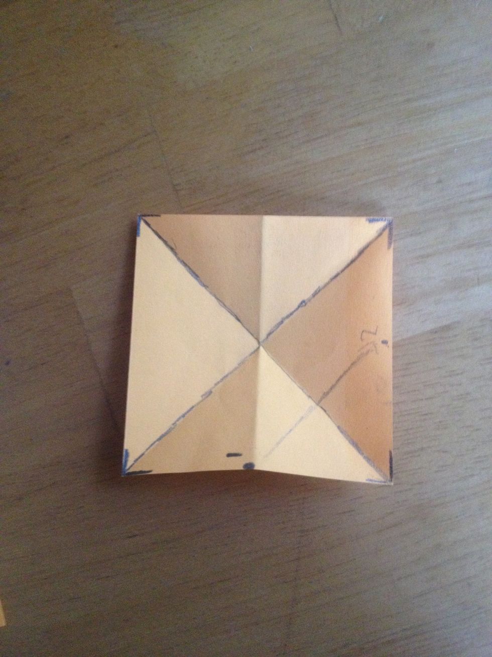 Grab point 1 and fold it to point 2