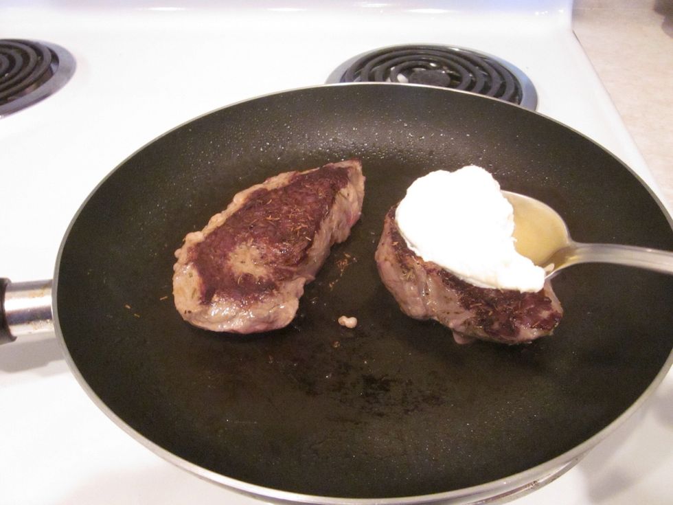 Grab some butter and melt it in the pan. Scoop some with a spoon and put it on top of the steak. What recipe does not get better when butter is added? None, because every thing is better with butter.