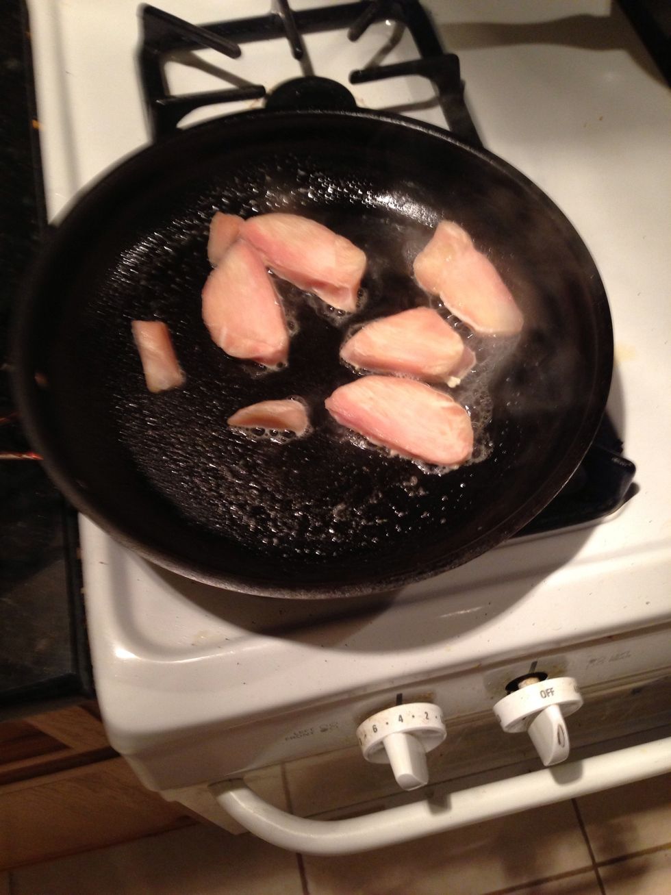 Grab some PAM and start cookin yo' chicken on medium heat