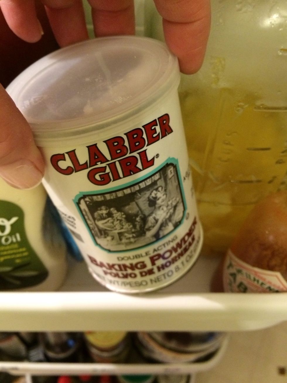 Grab the baking powder. I keep this in the fridge. It won't stay loose in the freezer. It freezes up.