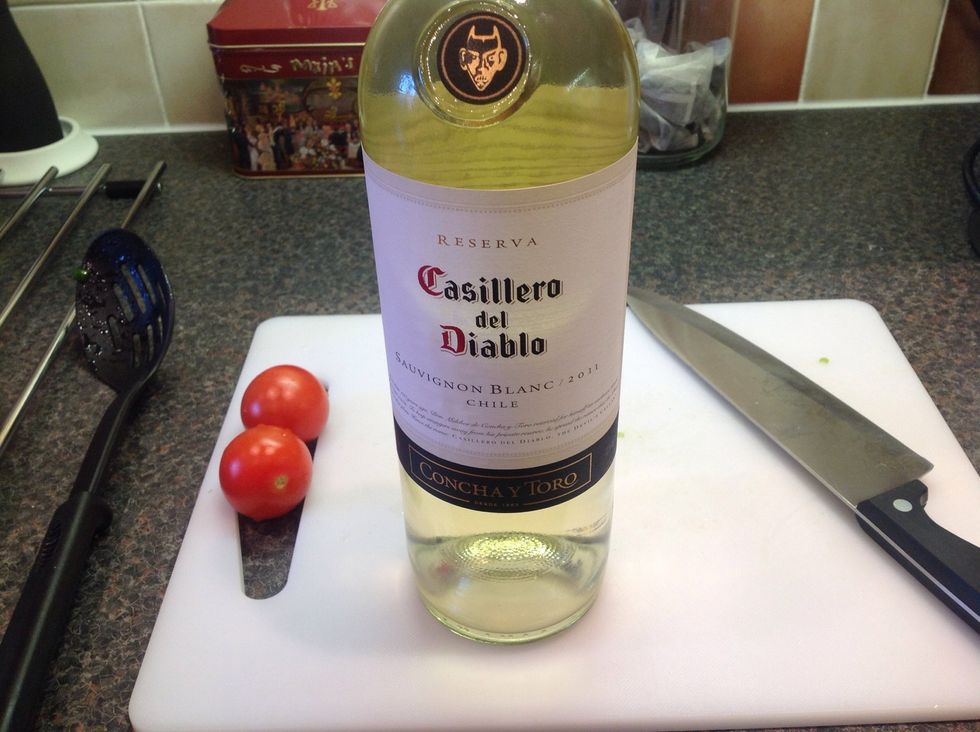 Grab the bottle of wine and consider whether it's okay to drink alcohol or not yet.