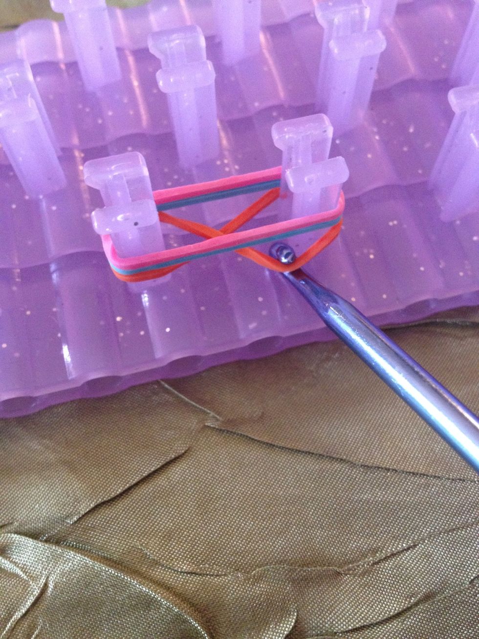 Grab the bottom band with your hook.