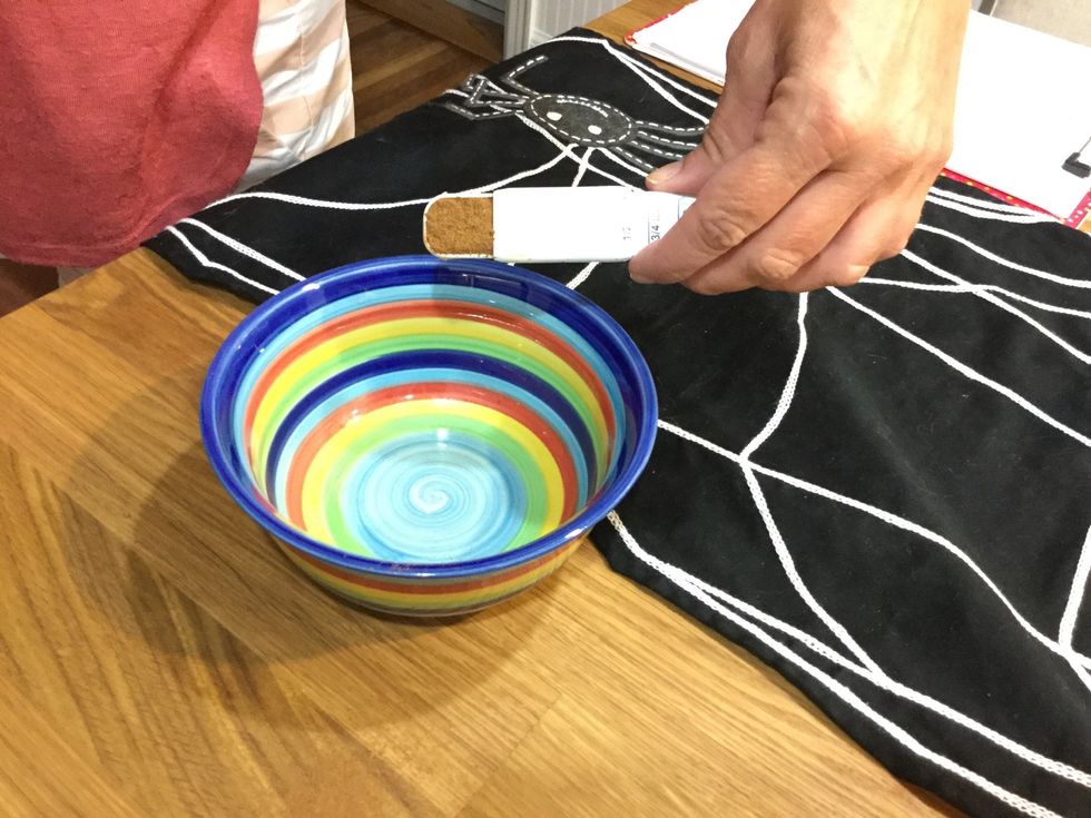 Grab the cinnamon and add 1/2 teaspoons to the bowl.