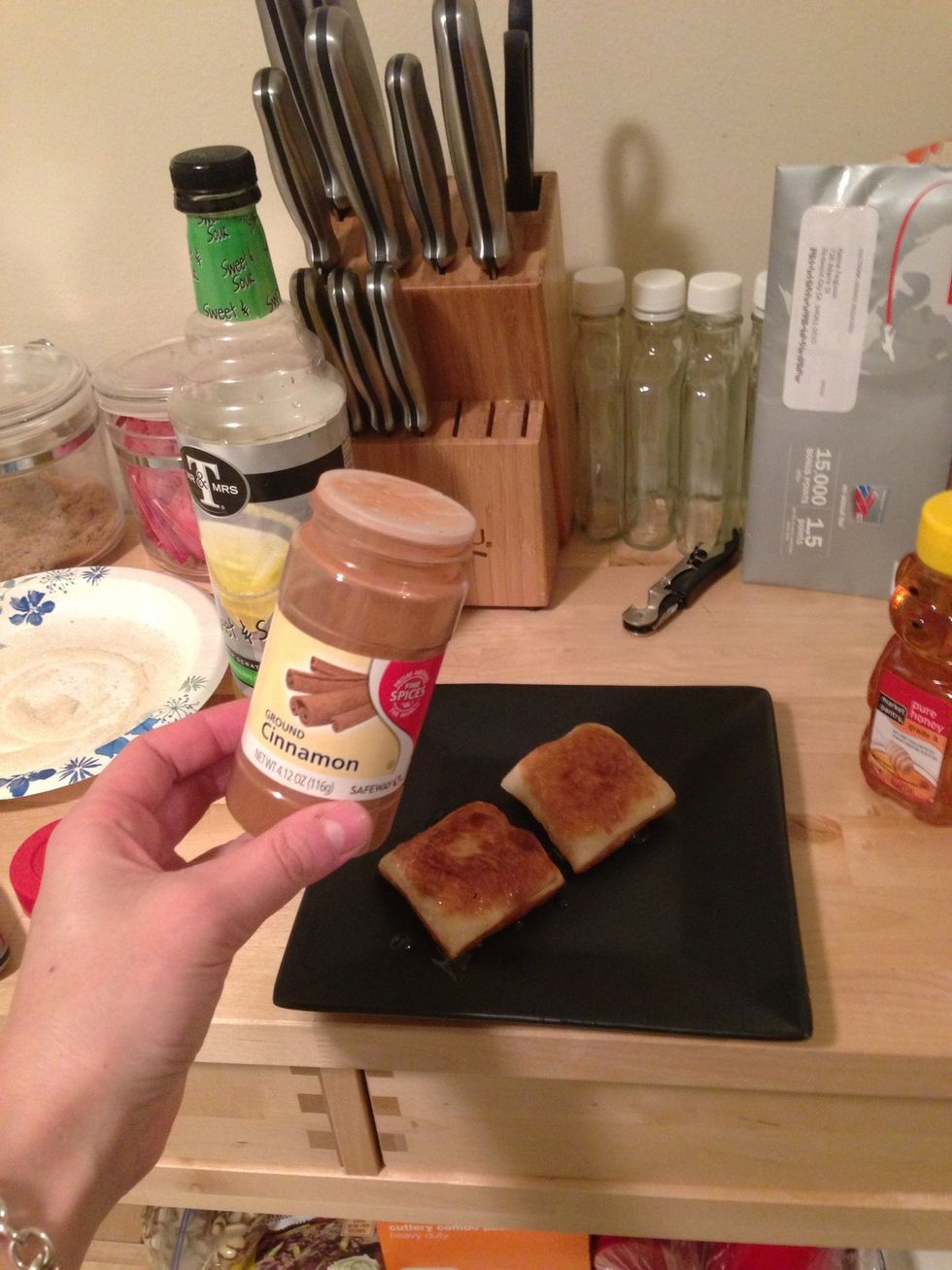 Grab the cinnamon and add to the top of the sopapillas.