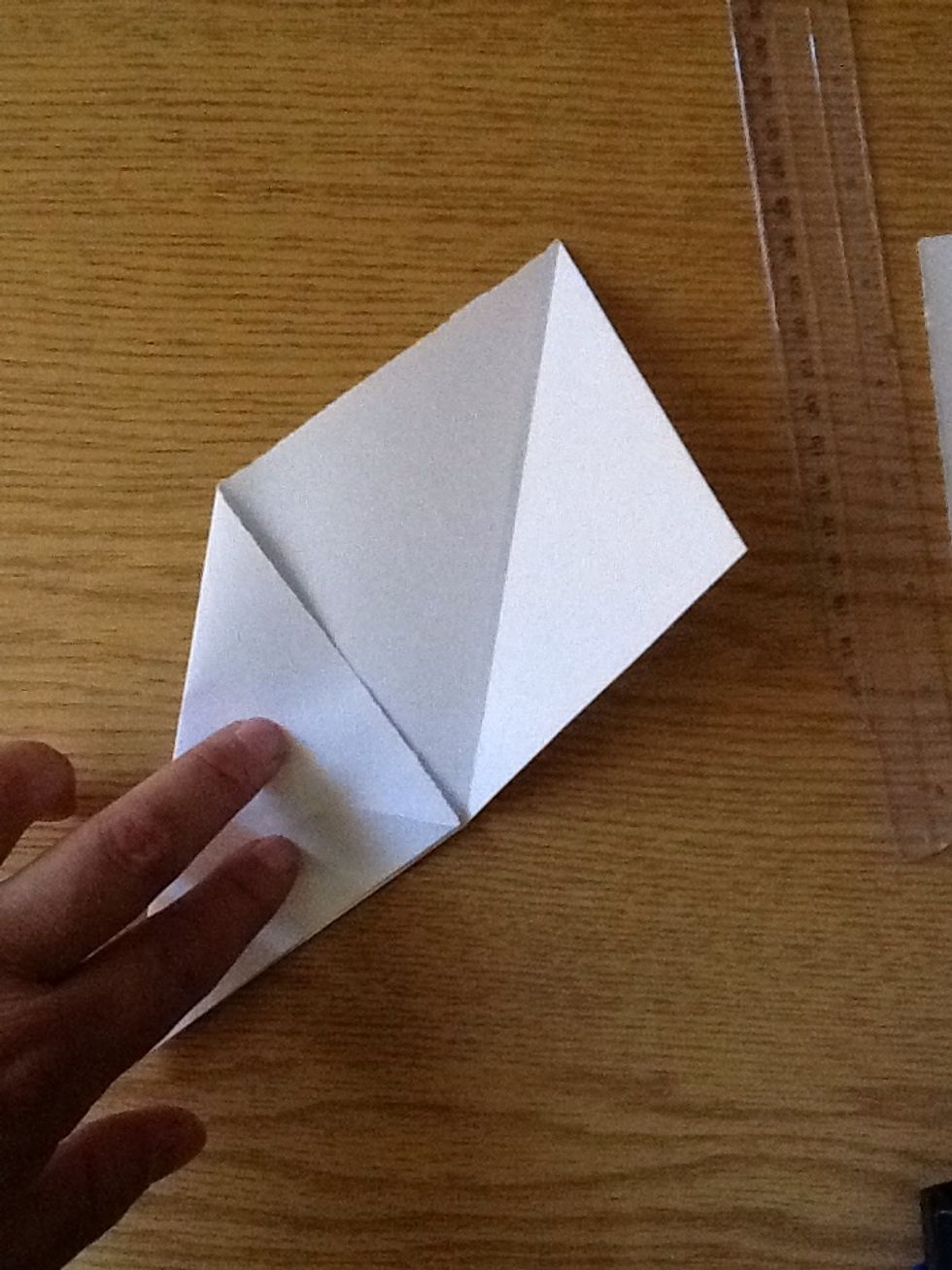 Grab the corner and fold it..