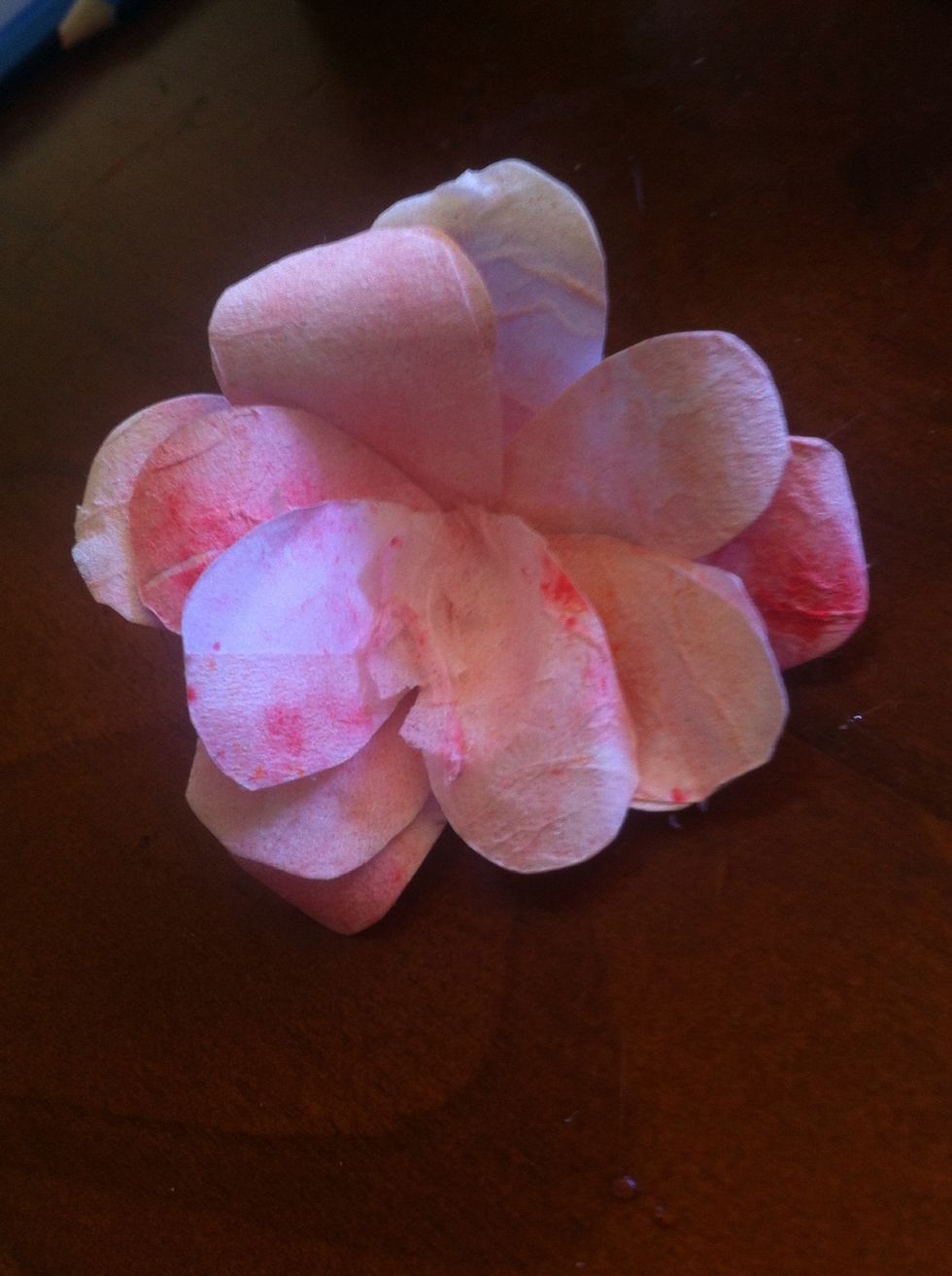 Grab the cut off petals and curl and glue inside aswell