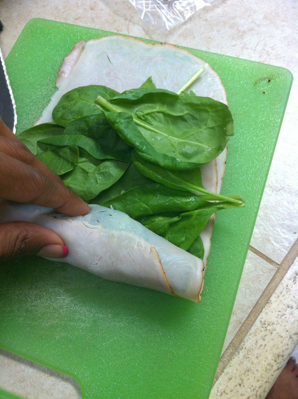 Grab the end of the lunch meat and roll to the end.