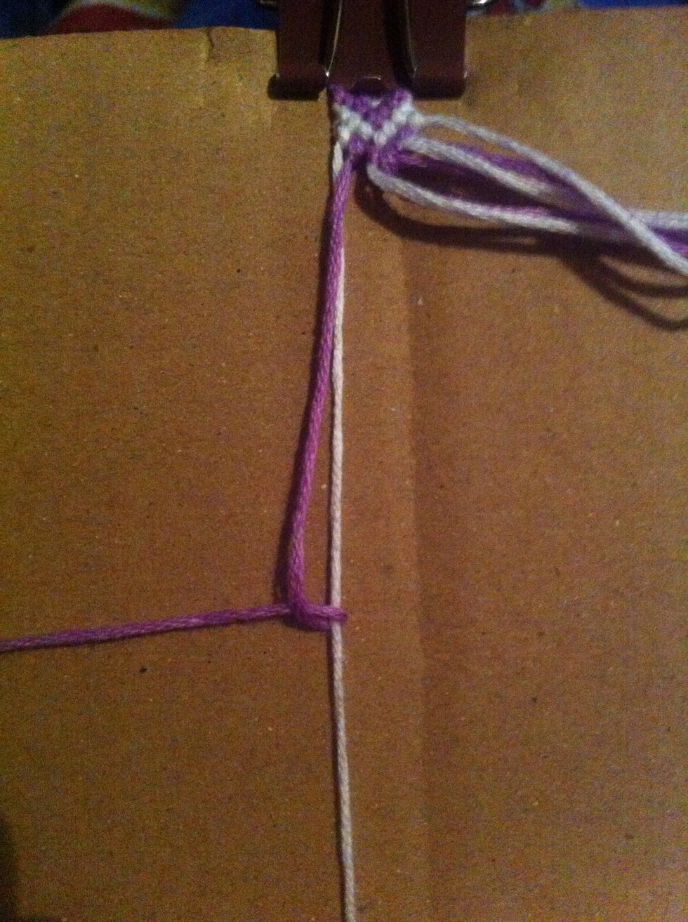 Grab the first 2 again and make a backward knot.