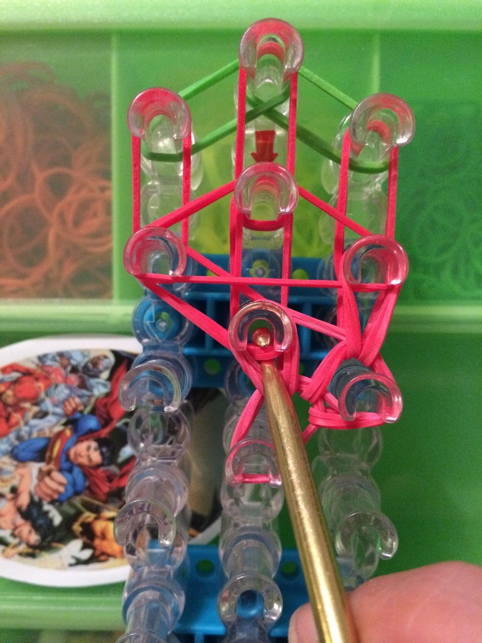 Grab the first 2 bands and move those bands to the left. You will be able to tell where the bands should go when you grab them.
