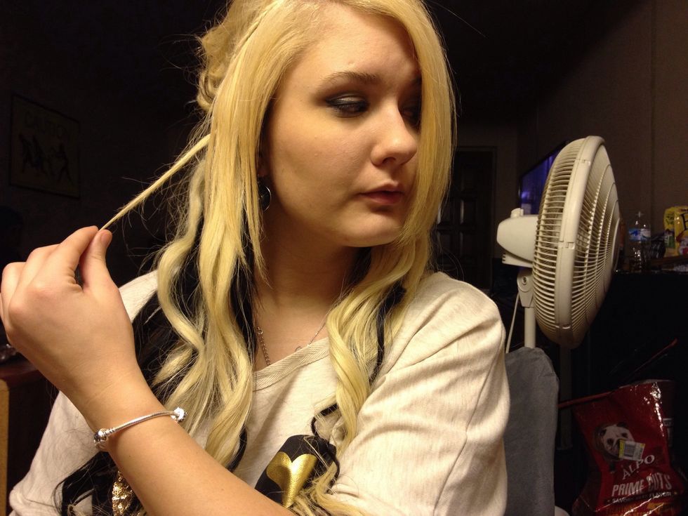 Grab the hair you left at the end (the strands you didn't braid)