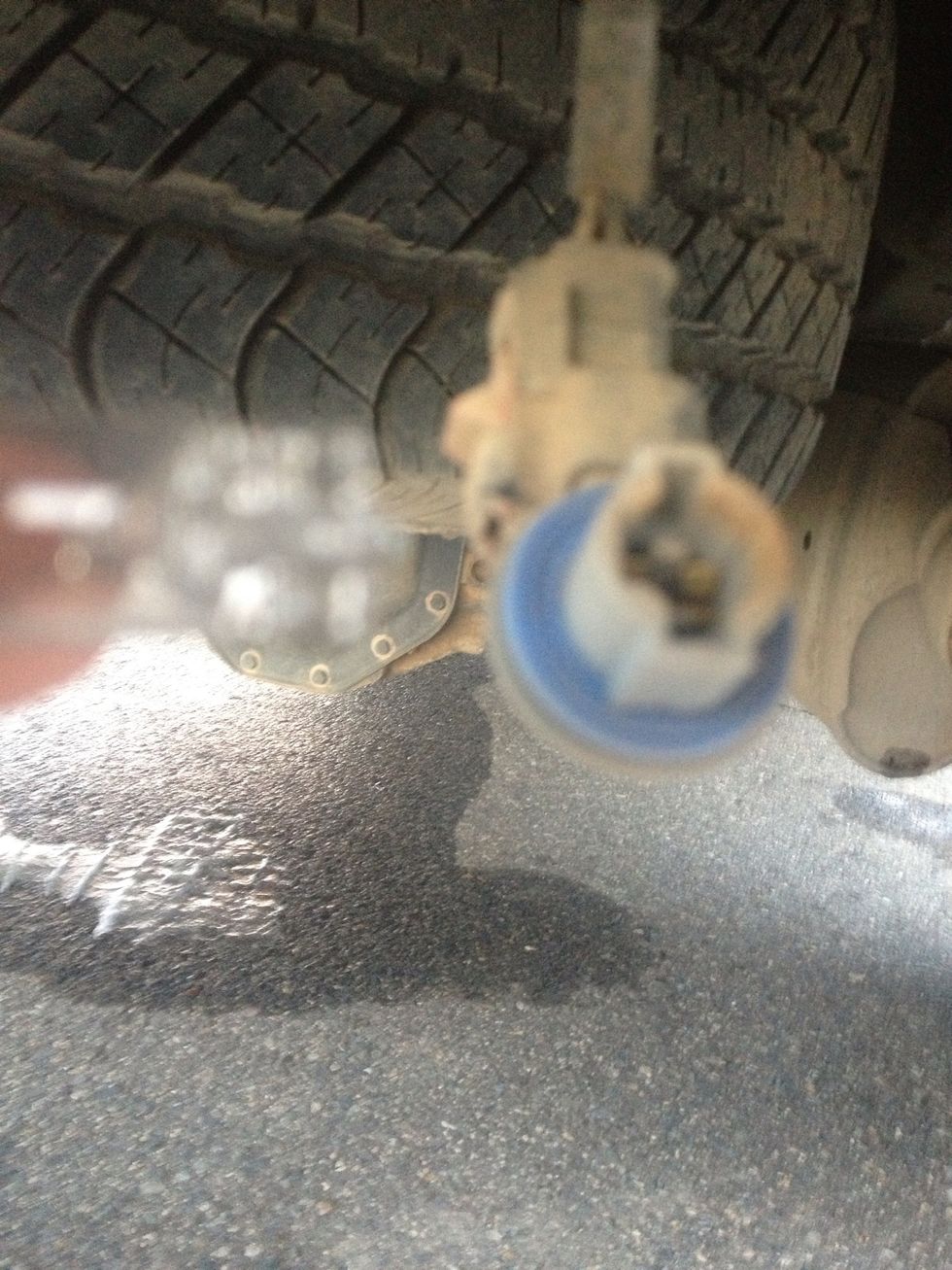 Grab the light with one hand and grab the plug with the other hand and pull them apart. The light should just come right about of the plug. At this point don't throw away the light!!