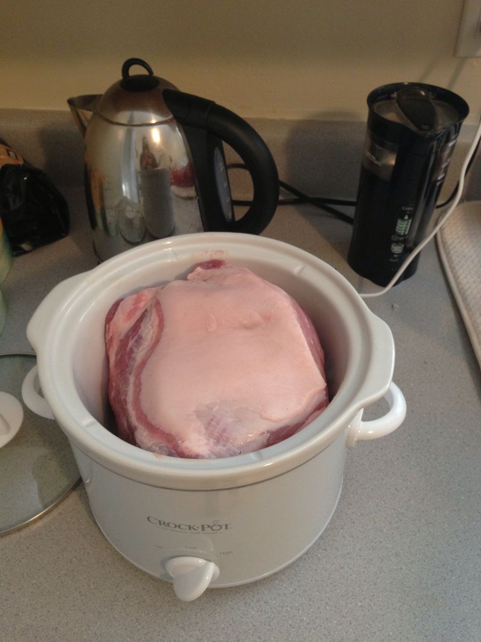 Grab the pork shoulder and put in the crock pot, fat side up.