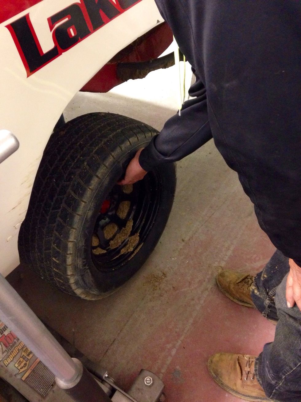 Grab the tire and yank it off.
