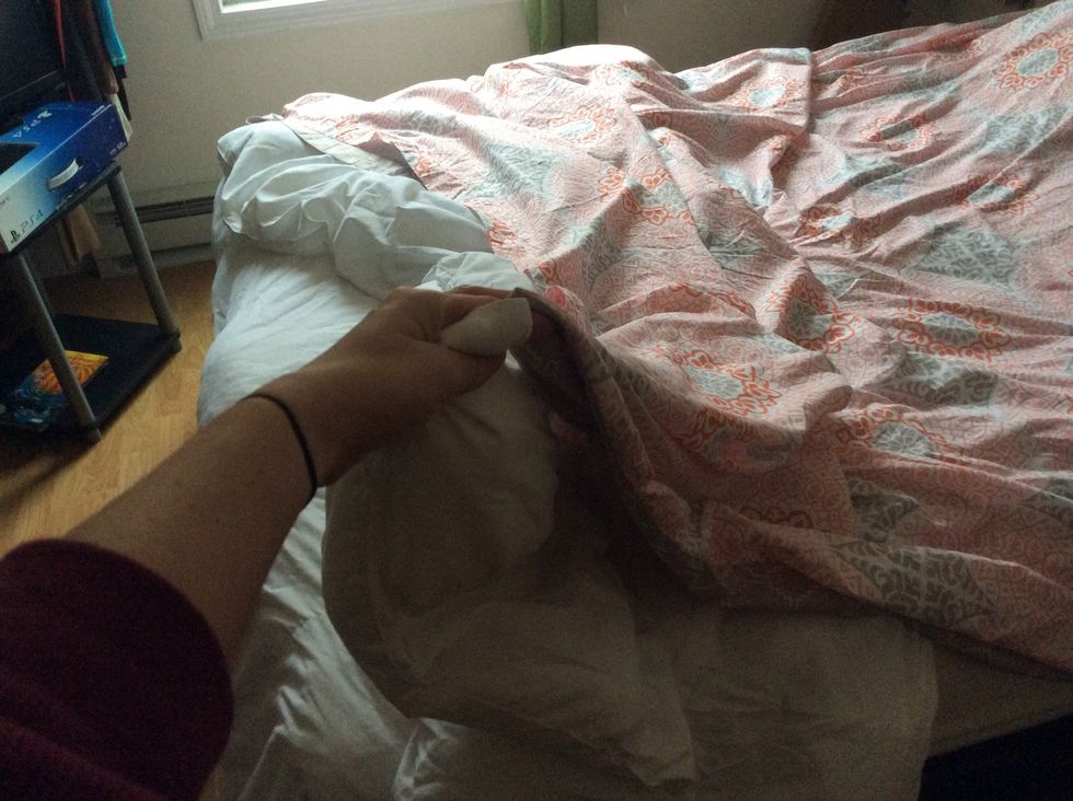 Grab the top corners the blanket and bottom corner of the duvet