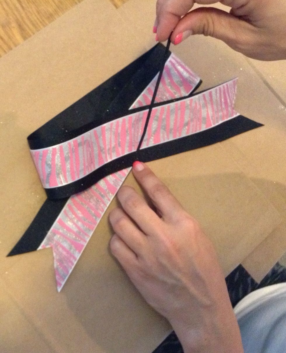 Grab the zip tie so it can be used to keep the ribbon in place.
