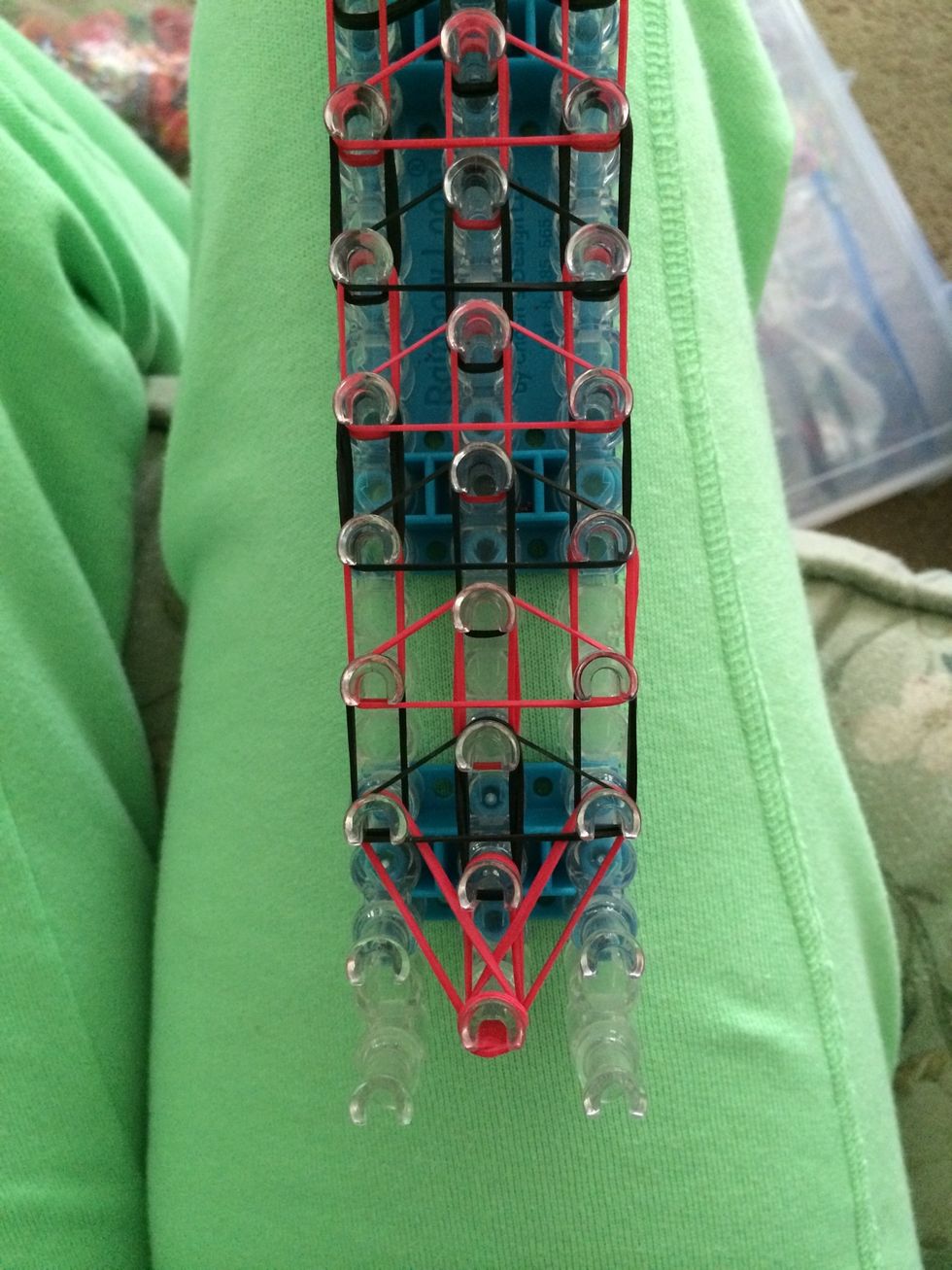 Grab three black rubber bands and make three more triangles