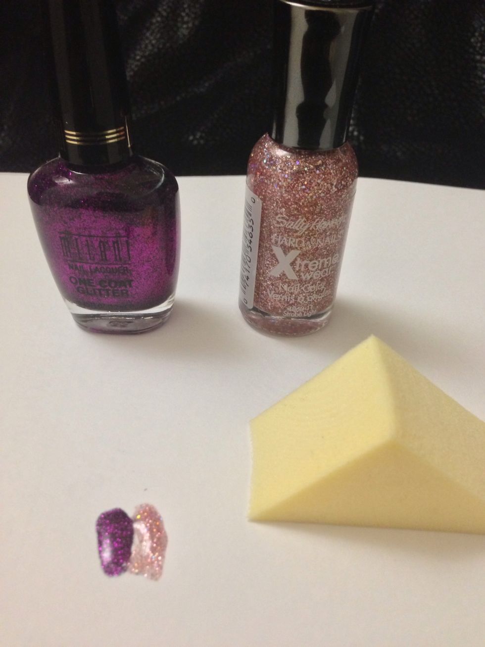Grab your darker color and your glitter color and add a few drops on some paper. Grab your sponge and dab both colors on the nail you left bare. Add as much or as little to the sponge as you like.