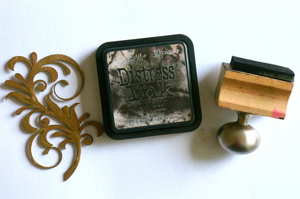 Grab your favorite ink, but make sure it's quite a bit darker than your piece. Apply a generous amount over your entire chipboard, making sure to really get it into those cracks!