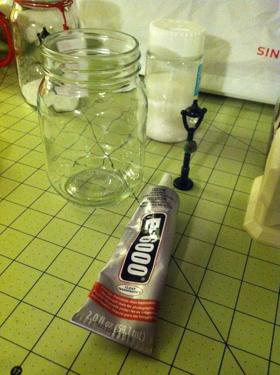 Grab your jar , glue, glitter, and figurine now. This e-6000 glue really is the best. Make sure you get the transparent kind.