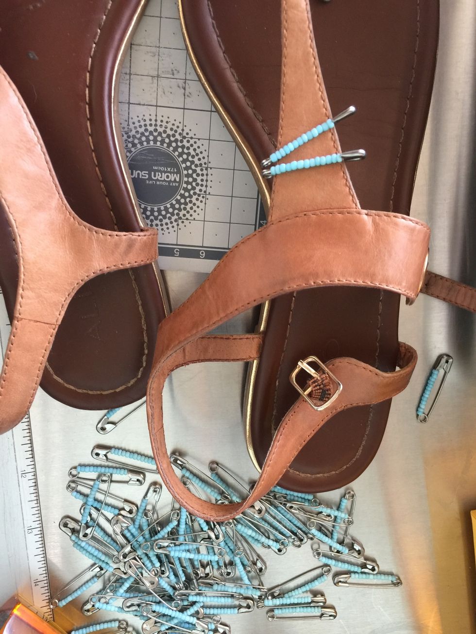 Grab your material there are latches with this tiny ornaments that can be put in one side of it