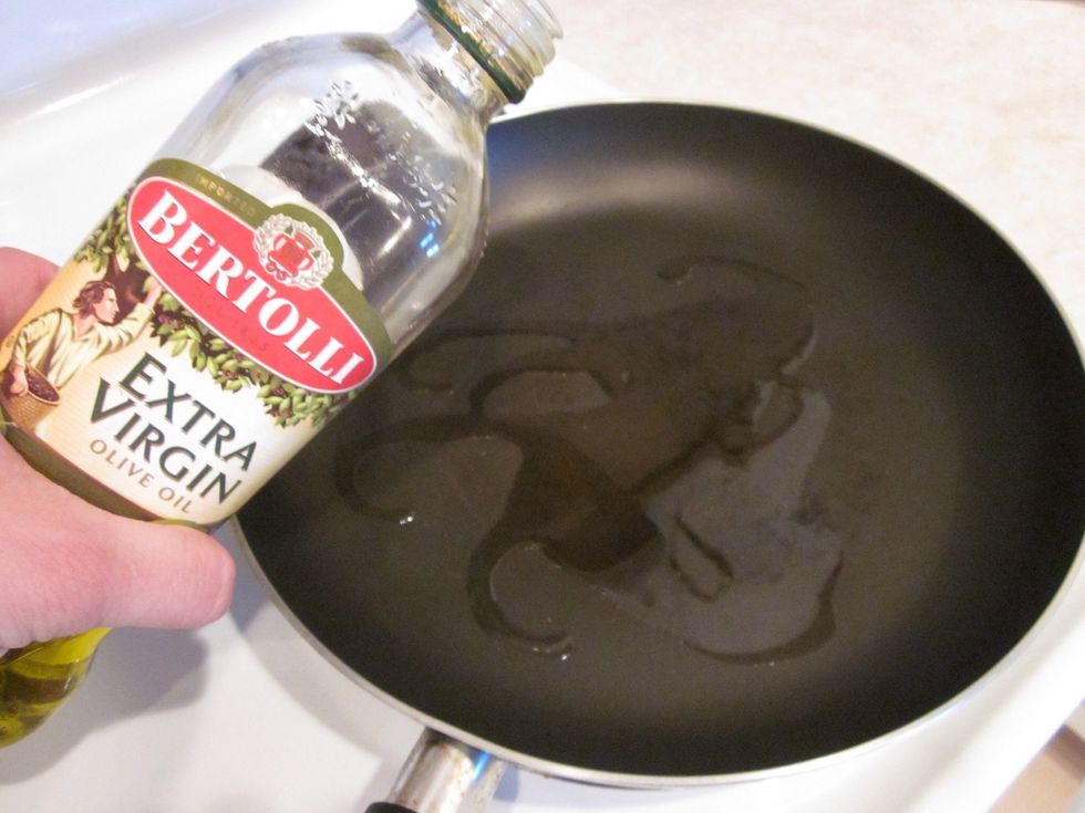 Grab your pan of choice. Add the olive oil and put in in the pan in high heat. Swirl it around a bit too, just don't go too crazy, we got things to do here.