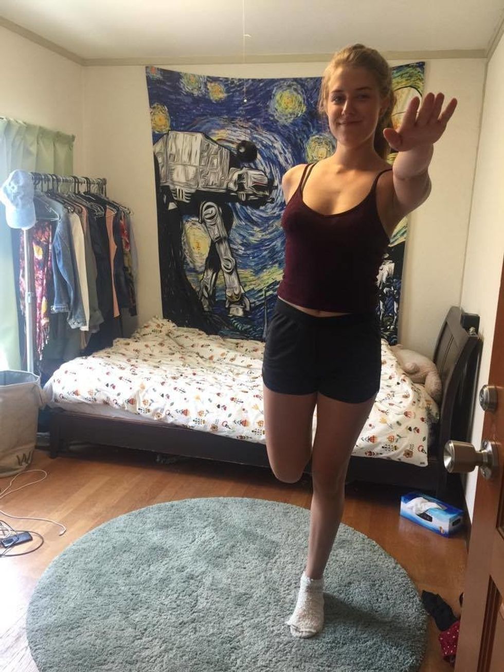 Grab your right ankle and pull towards your body. Hold for 16 seconds, maintaining your balance. This stretches your upper thigh.