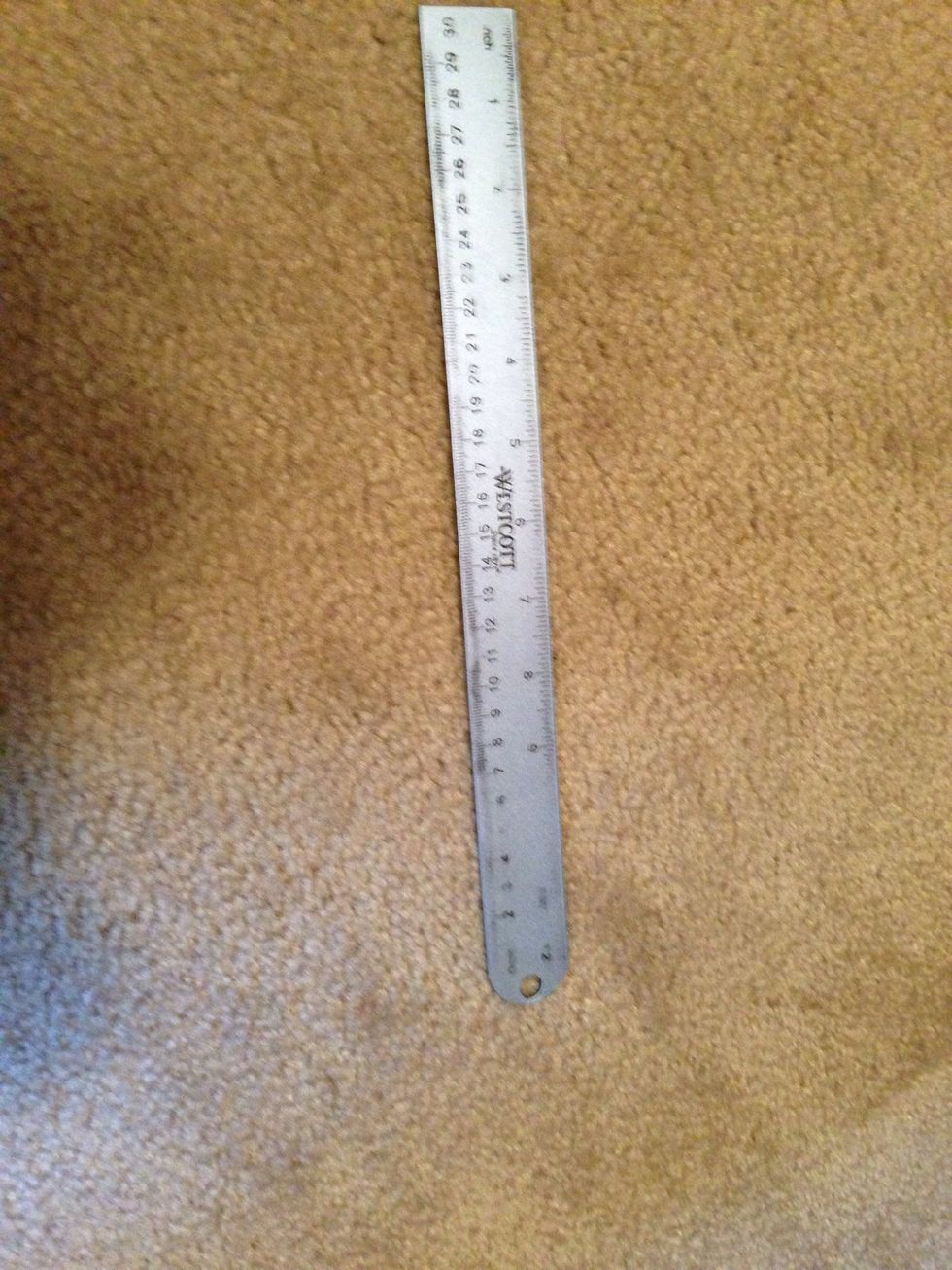 Grab your ruler and cut the strings the length that best fits your wrist size.  Cut each string 55" for small wrist, 65" for medium wrist, and 75" for large wrist.