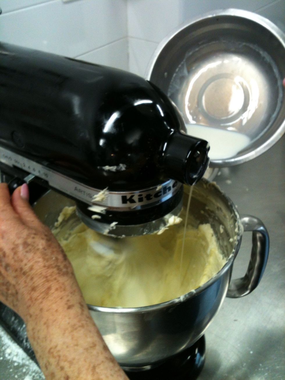 Gradually Add egg whites and milk in a constant thread