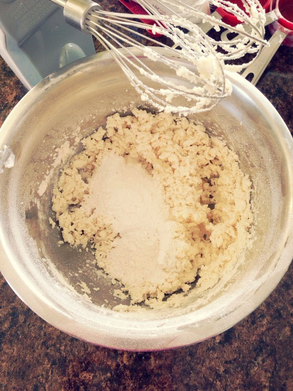 Gradually add flour mixture to butter mixture. Beat at low speed until just combined.