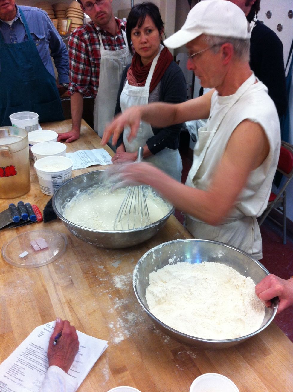 Gradually add flour until it becomes difficult to whisk (thin batter).