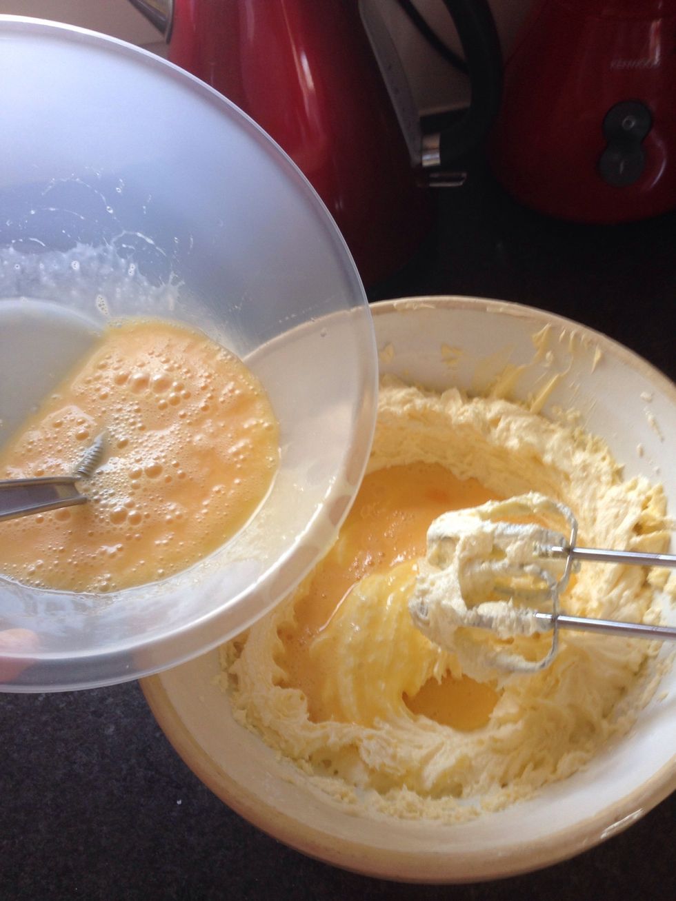 Gradually add in the eggs, mixing well between each