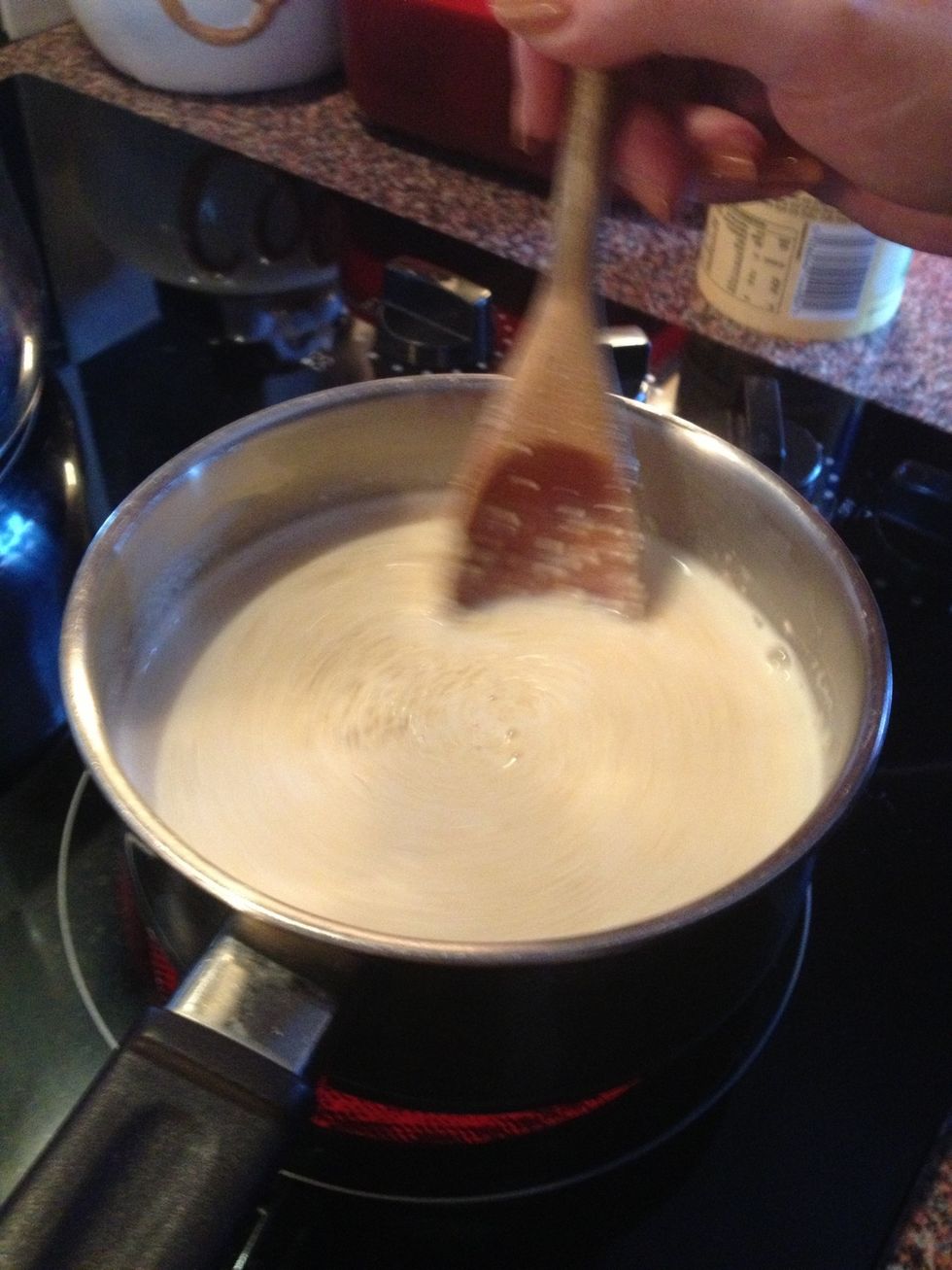 Gradually add in you preferred cheese sauce (8 tablespoons) stir until it thickens