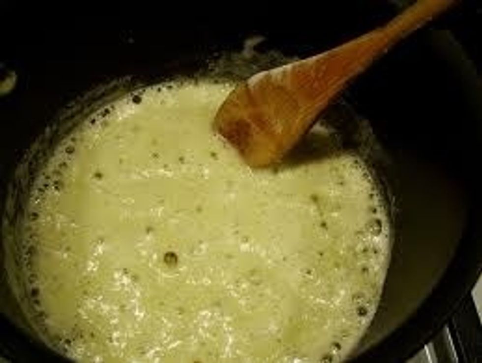 Gradually add milk, whisking constantly to avoid lumps.