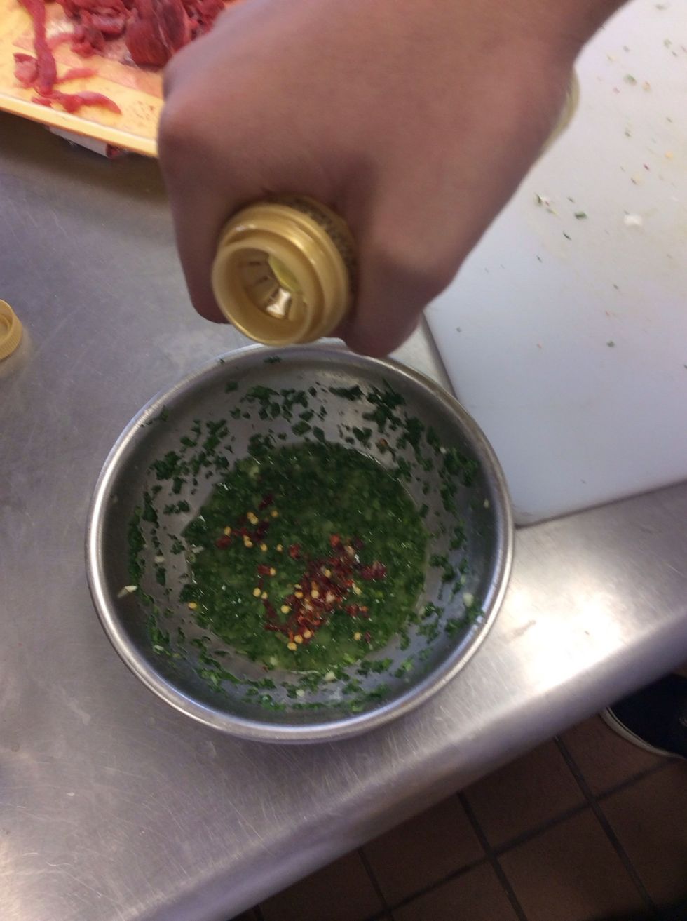 Gradually add olive oil to cilantro and parsley (Add pepper flakes if you want) This is your Chimichuri sauce.