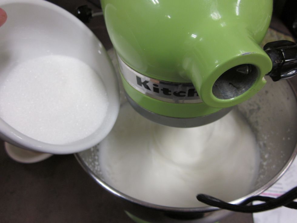 gradually add sugar and vanilla until soft peaks form