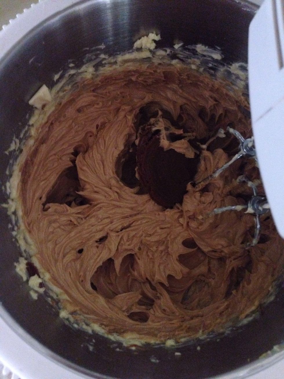 Gradually add the caramel and continue beating