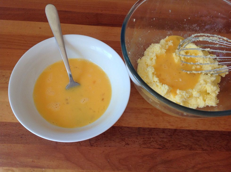 Gradually add the egg to the butter and sugar