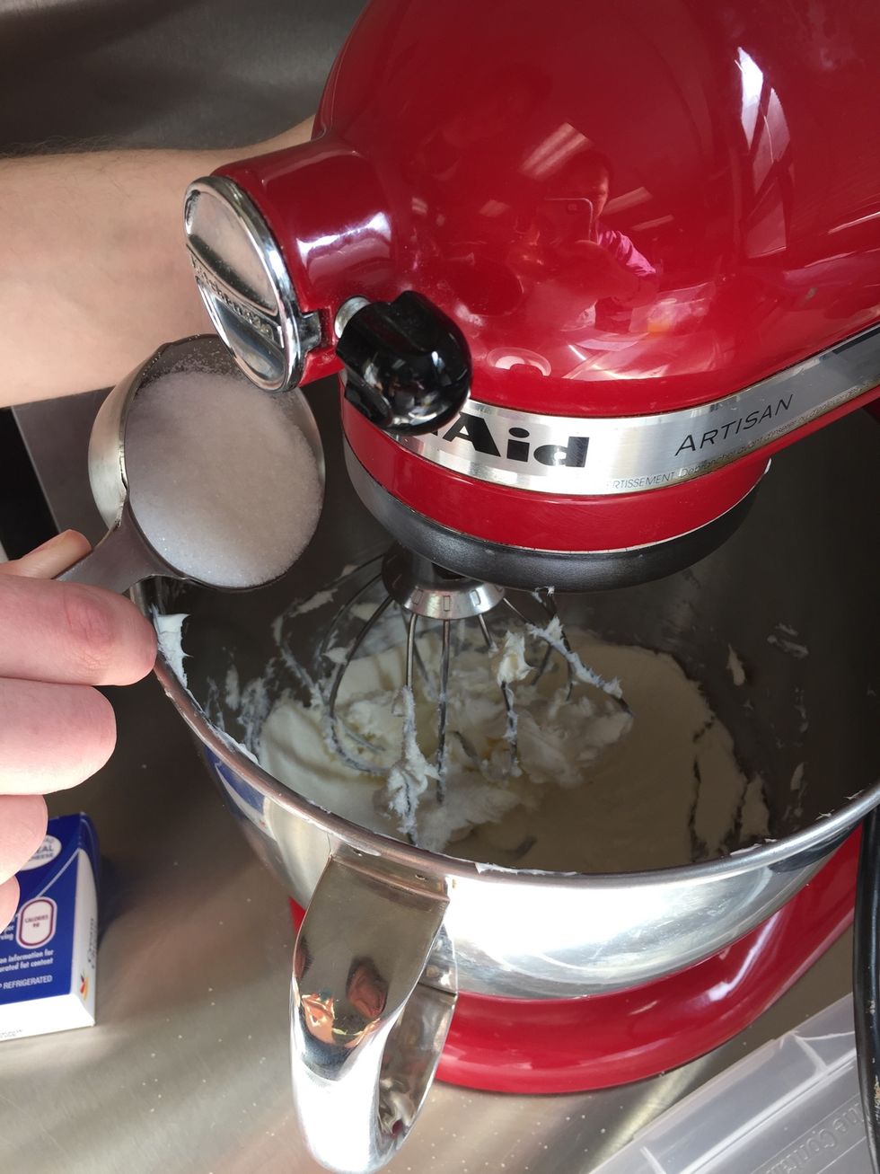 Gradually add the sugar to the cream cheese 1/4 cup at a time beating well after each addition.