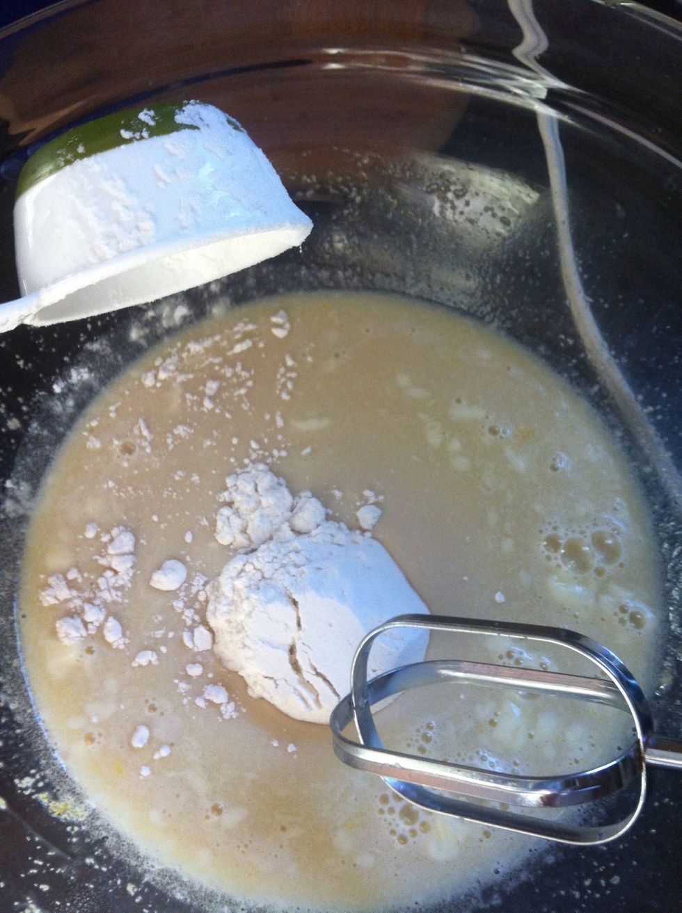 Gradually add your 2 1/2 cups flour into batter.