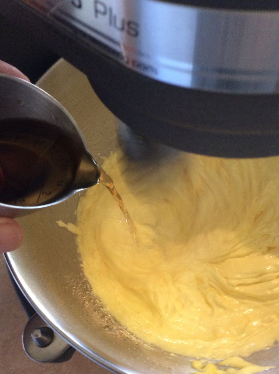 Gradually blend in the brandy, be sure to scrape down the sides and blend thoroughly. After the eggs have been whipped about 8 minutes and cool (about room temp) remove from mixer.