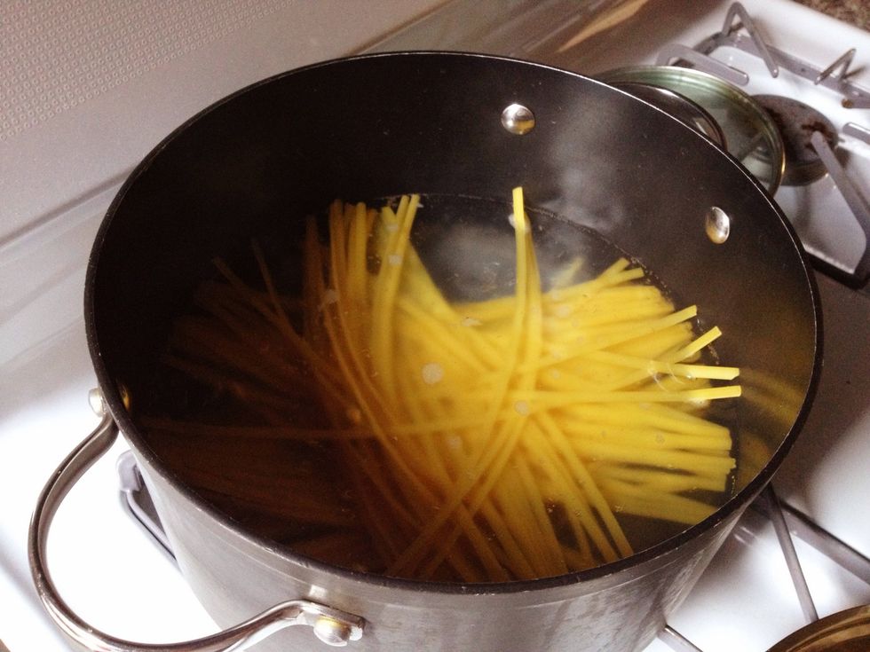 Gradually stir in pasta; return to boiling. Boil, uncovered according to recommended time on pasta package, stirring occasionally.