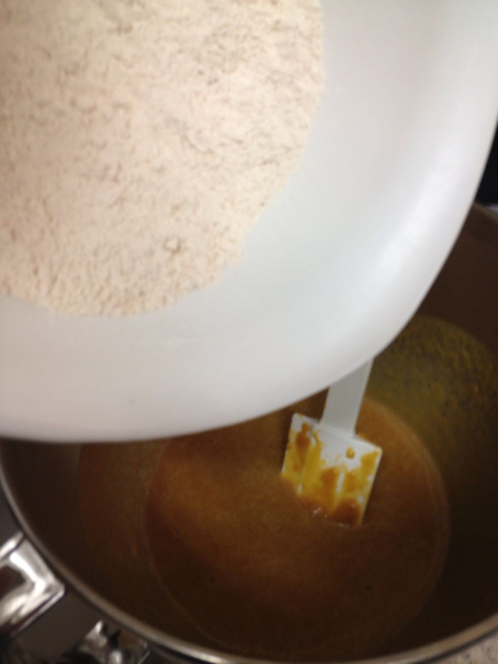 Gradually stir the dry into the wet. Be careful not to overmix