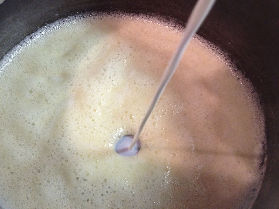Gradually whisk in the half and half and cook, whisking constantly until the mixture is hot and thick, about 4 minutes.