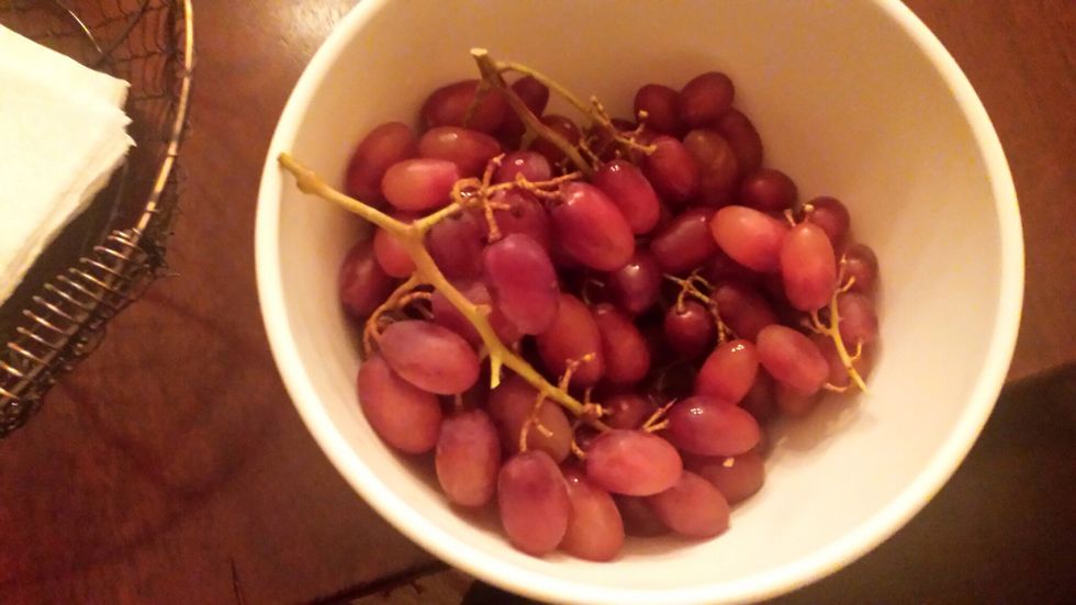 Grapes. Wash the grapes and put them in a bowl.