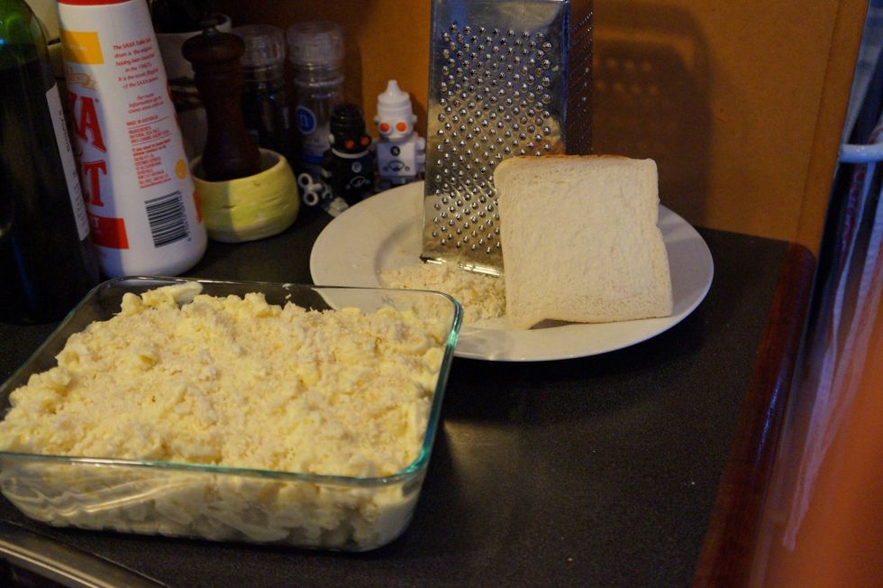 Grate a slice of stale bread on top of your mac and cheese to give it a crunchy top after its cooked