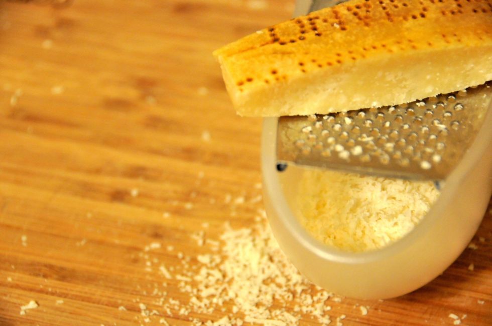 Grate about 1/4 cup or more of parmesan. This will be added to the egg and milk that will make the sauce for this dish. Save a little extra to sprinkle on the pasta before serving.