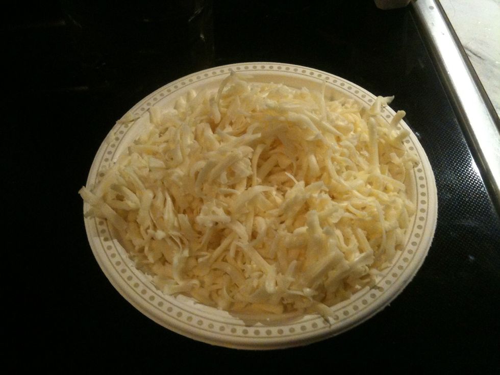 Grate cheese. I like cheese so this is about 8-10 oz of cheese!
