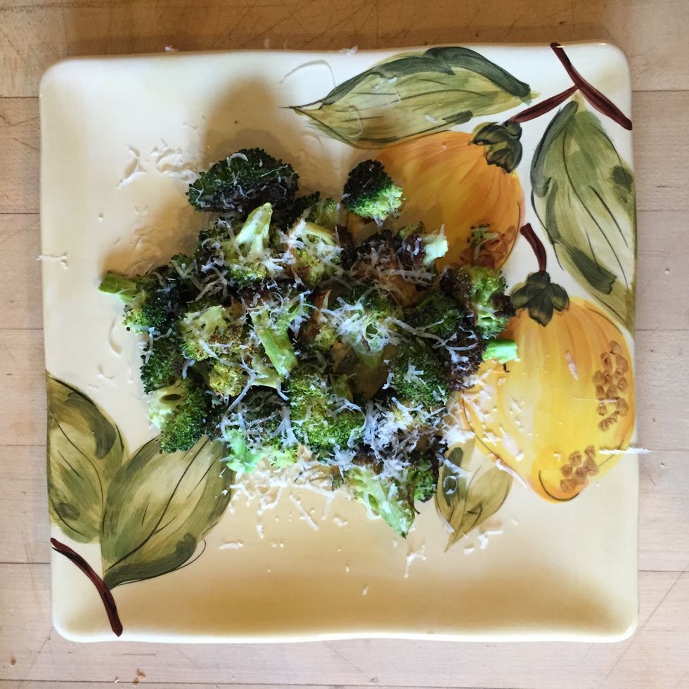 Grate cheese over broccoli and enjoy!