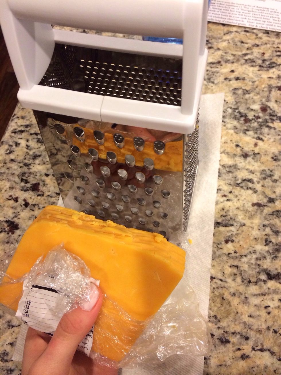 Grate cheese
