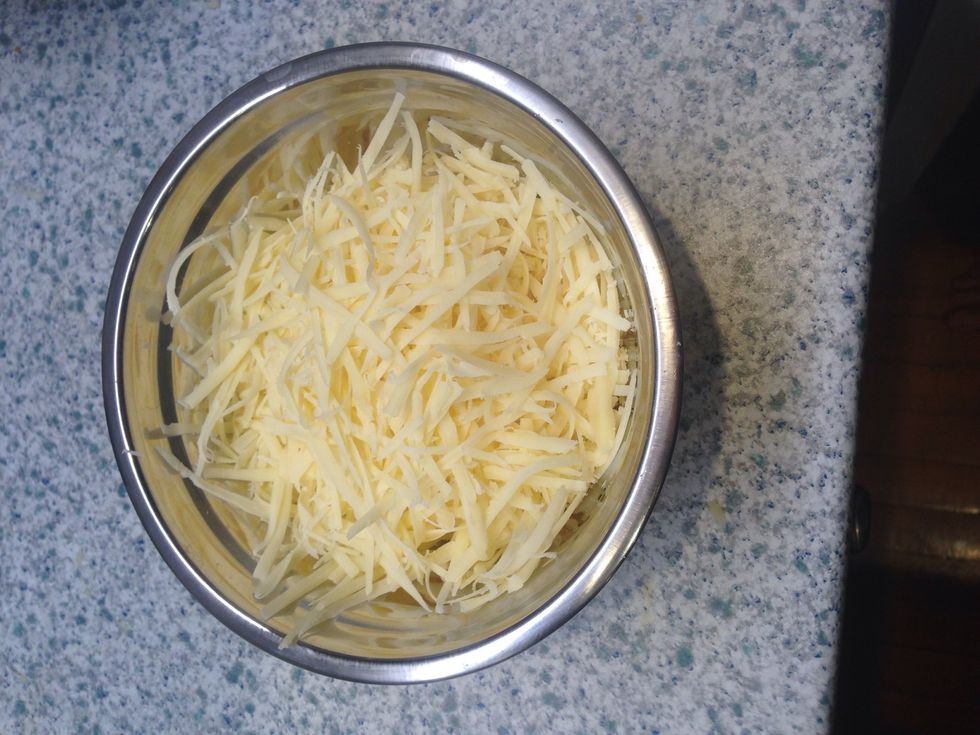 Grate cheese.